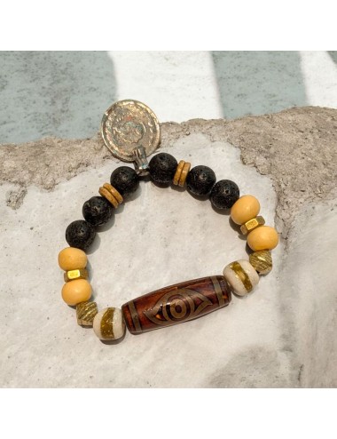 Pulsera artesanal ORUS piedras blancas, y piedra central marrón