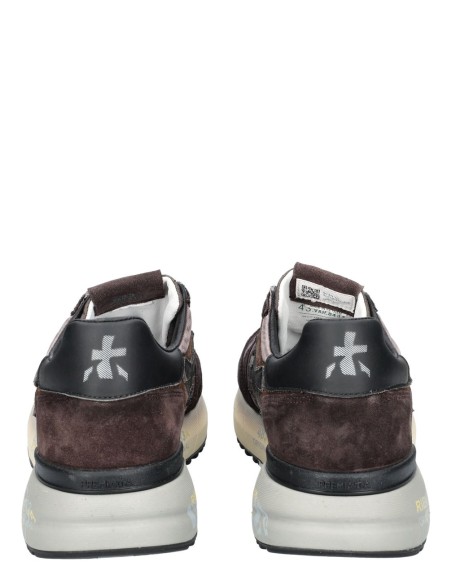 Premiata Mick 8434 marrón nailon lavado vista trasera de talonera negra con logo