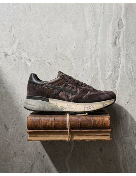 Premiata Mick 8434 marrón nailon lavado vista lateral sobe libros