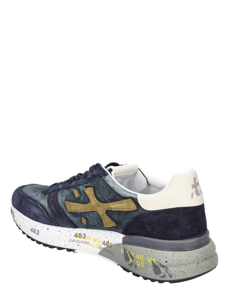 premiata mick azul 8435 vista lateral pisando la neve en Almirante Seis Madrid y egomadrid.com vista talonera e interno