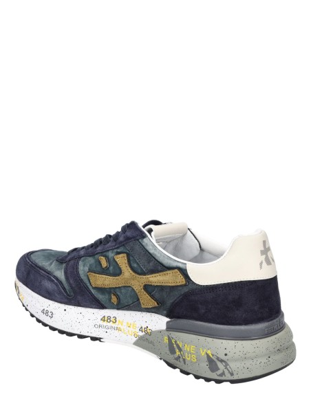 premiata mick azul 8435 vista lateral pisando la neve en Almirante Seis Madrid y egomadrid.com vista talonera e interno