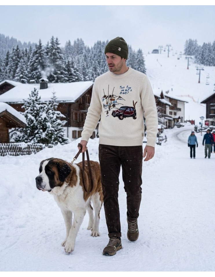 Bob jersey cuello redondo blanco de lana bordados frontales paseando un san bernardo por la nieve