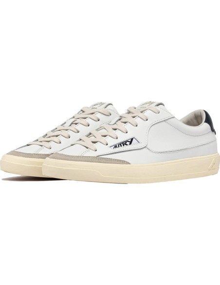 Autry sneakers hombre Windscape blanca talonera azul oscuro vista lateral dos pies