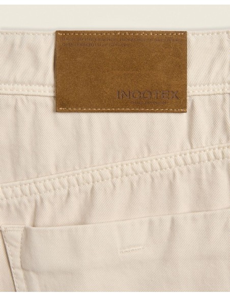Incotex Pantalón cinco bolsillos algodón cashmere marfil detalle parche trasero en piel