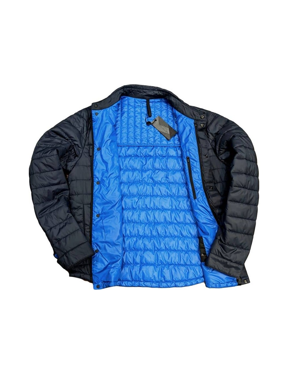 Sobrecamisa Montedoro con encapsulado tipo plumas en tejido técnico.