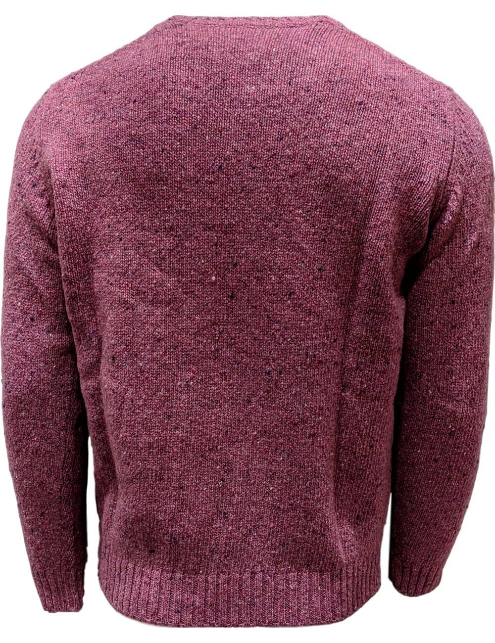 Sueter confeccionado en lana y cashemere, jaspeado,  color brillante e intenso.