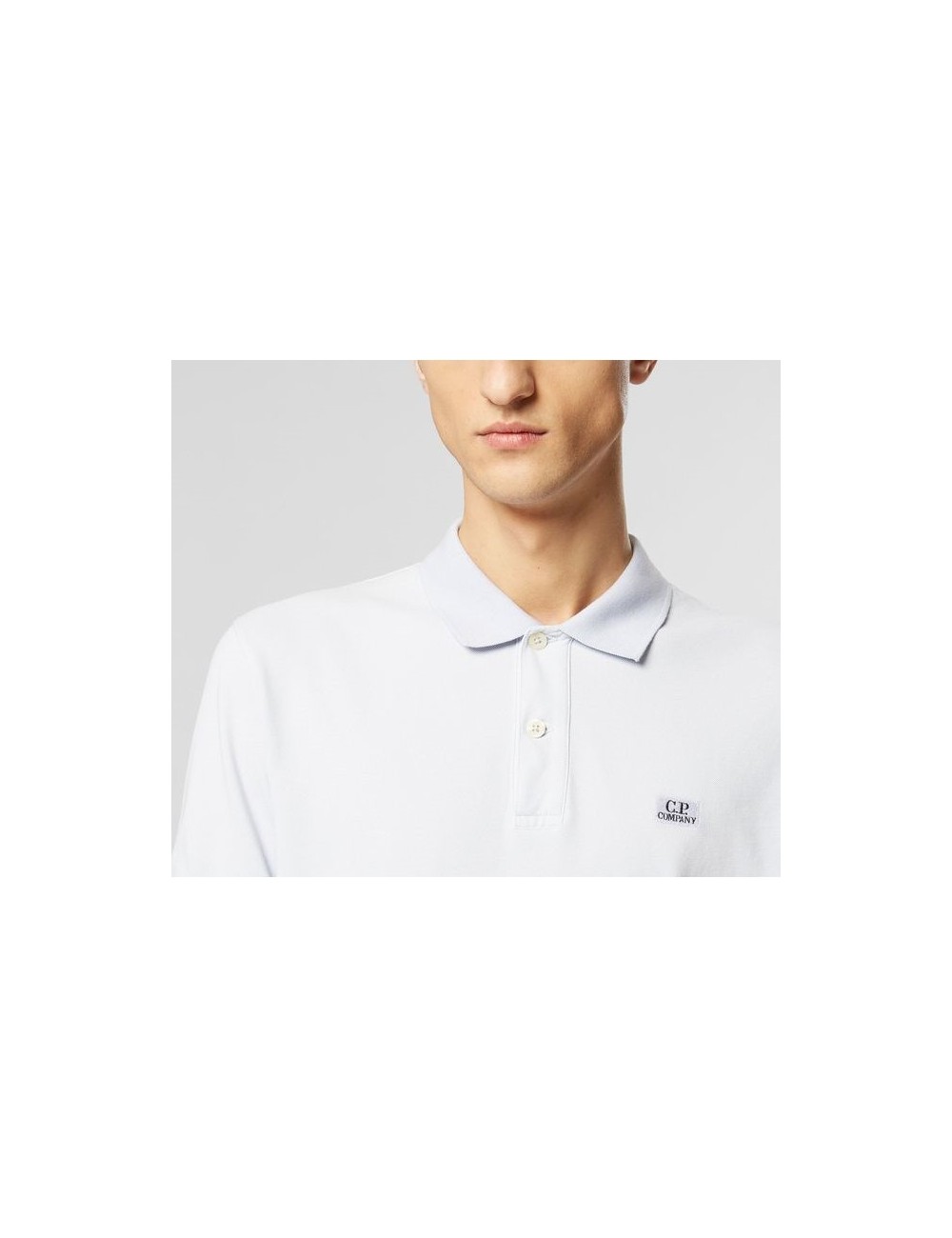 Polo Tacting CP Company azul claro en Ego Madrid